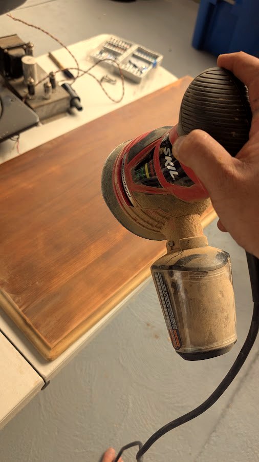 Hand-refinishing the Packard Bell cabinet